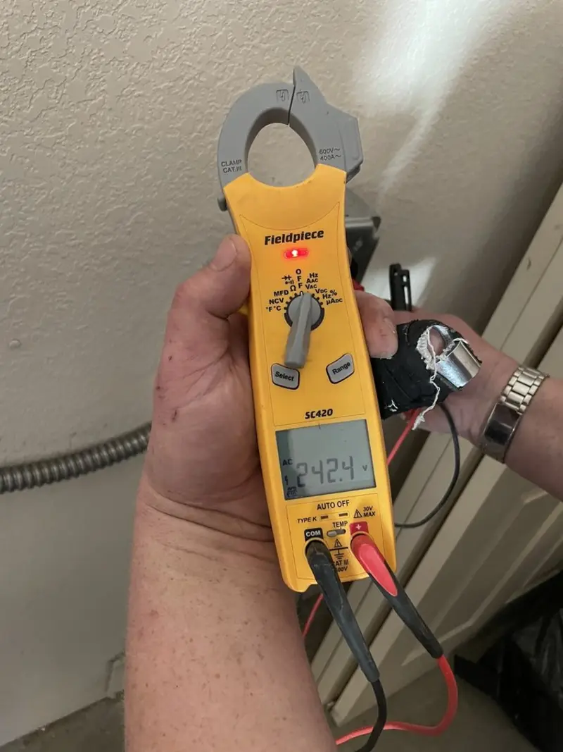 Voltage testing with clamp meter during Hot Tub / Pool Electrical Wiring in Platte City